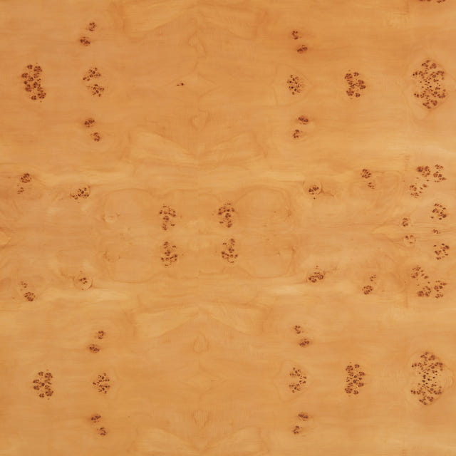 Close-up of a wood grain pattern with brown and beige colors