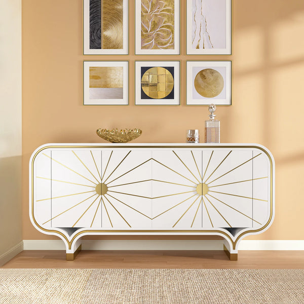 Decorative modern 4-door buffet with gold accents against a wall with framed art.