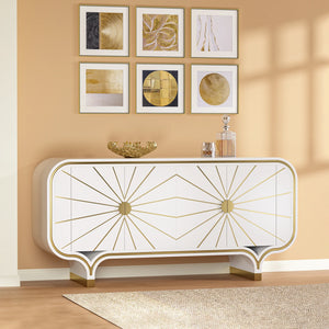 Decorative 4-door buffet with gold accents against a beige wall with framed art.